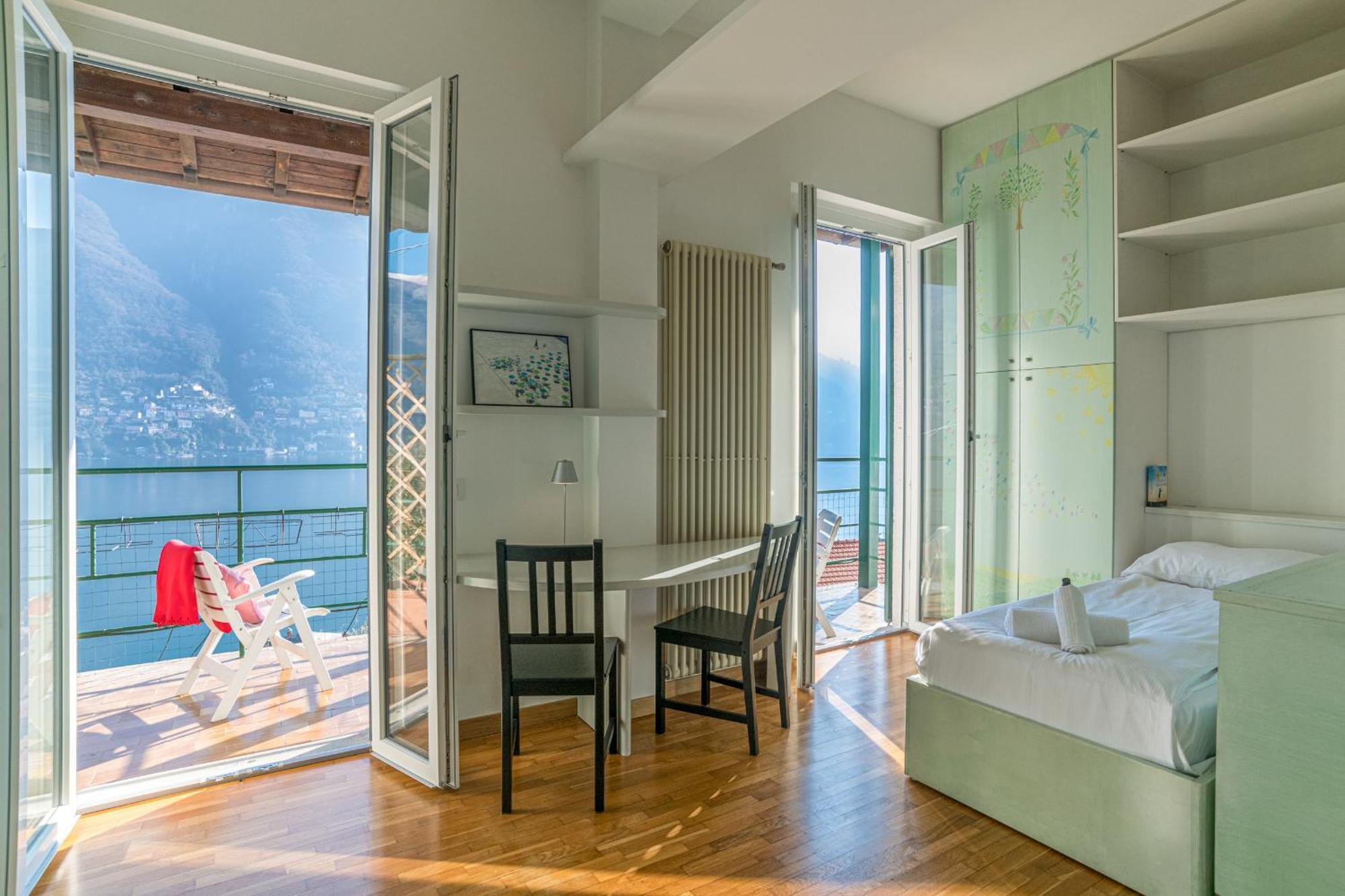 Casa Bambu - Splendida Vista Lago E Posto Auto Laglio Bagian luar foto