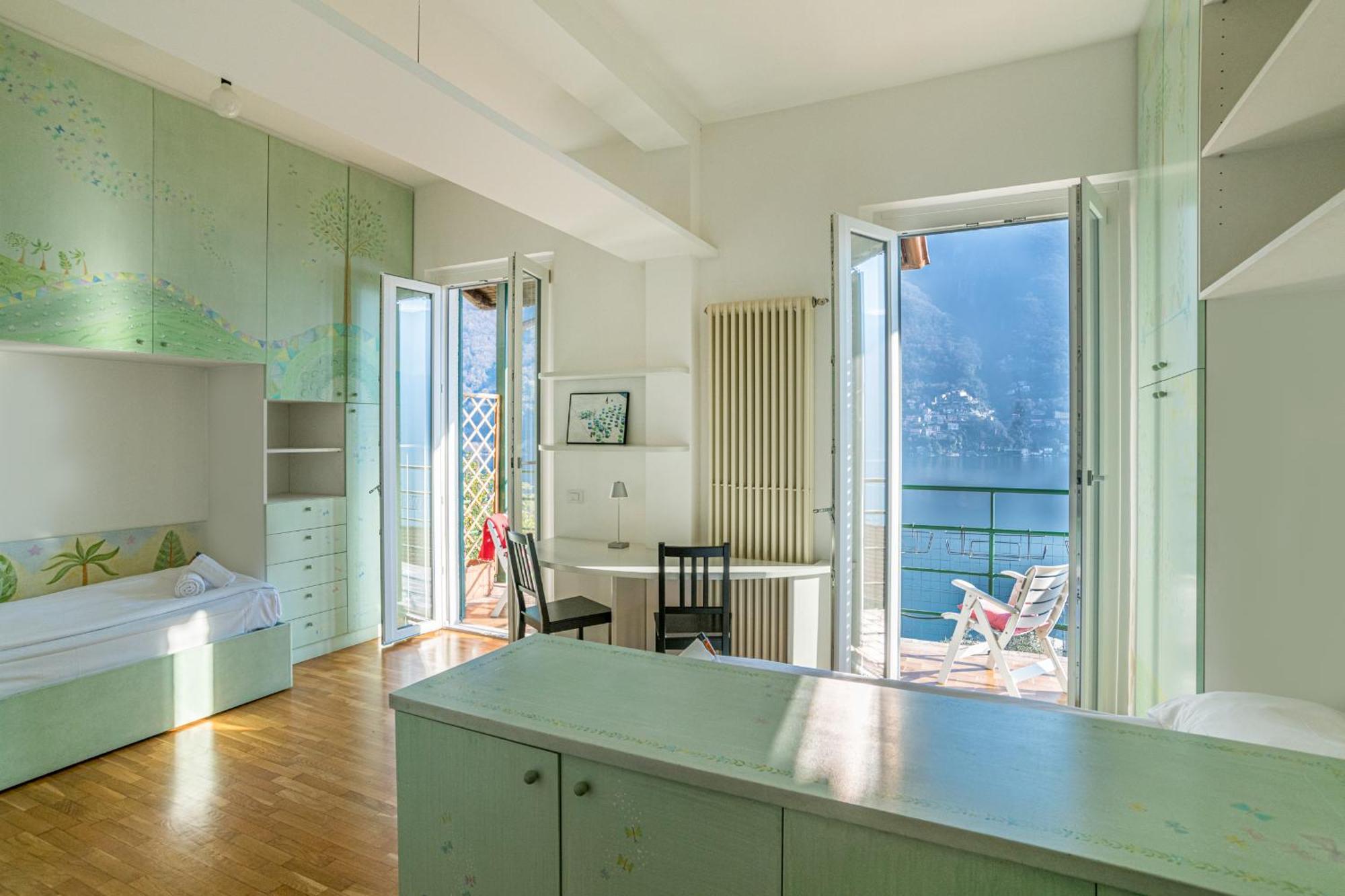 Casa Bambu - Splendida Vista Lago E Posto Auto Laglio Bagian luar foto